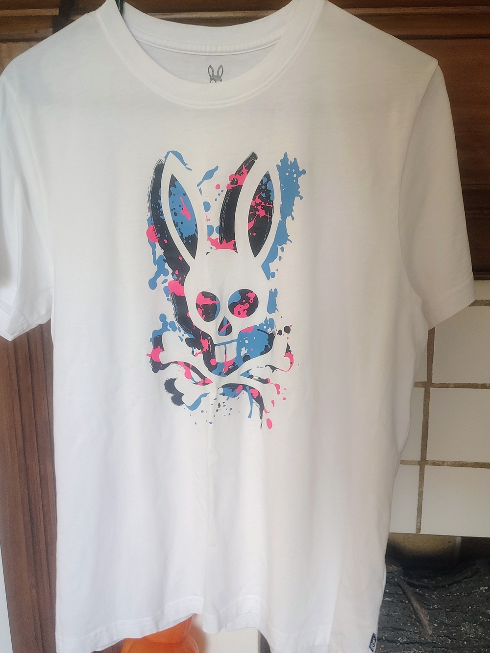 Psycho Bunny White Tee with Blue Pink and Black Graphic Bunny
